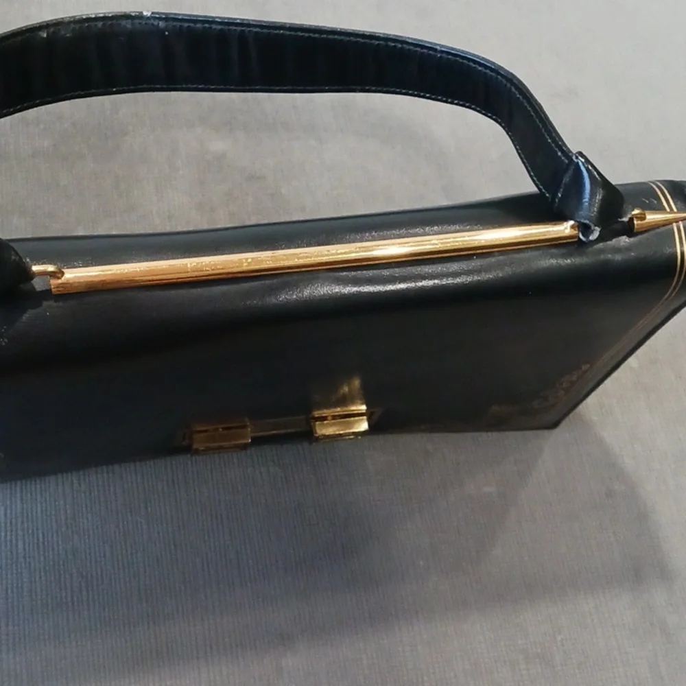 Black Shoulder Bag with Gold Accents